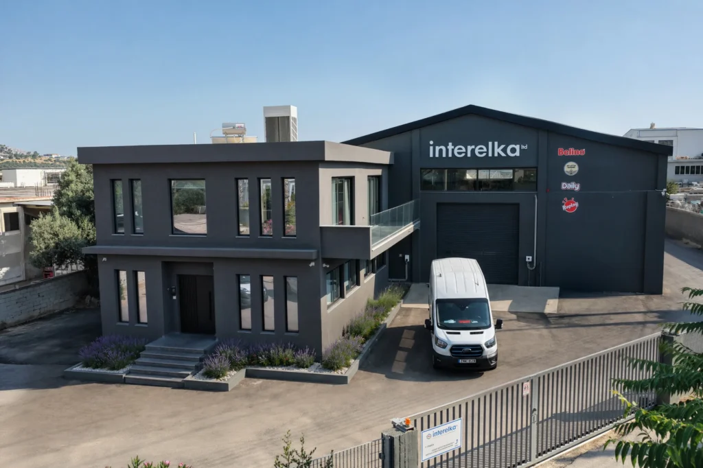 Side view of the Interelka headquarters building in Koropi