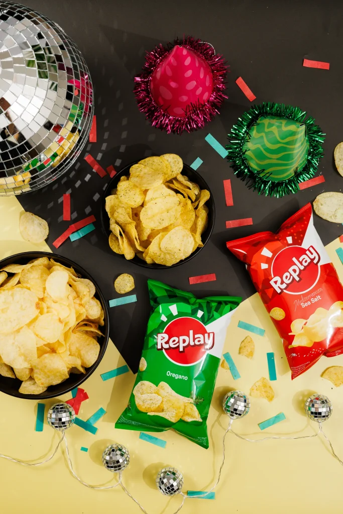 Replay crisps served in bowls with disco balls and confetti