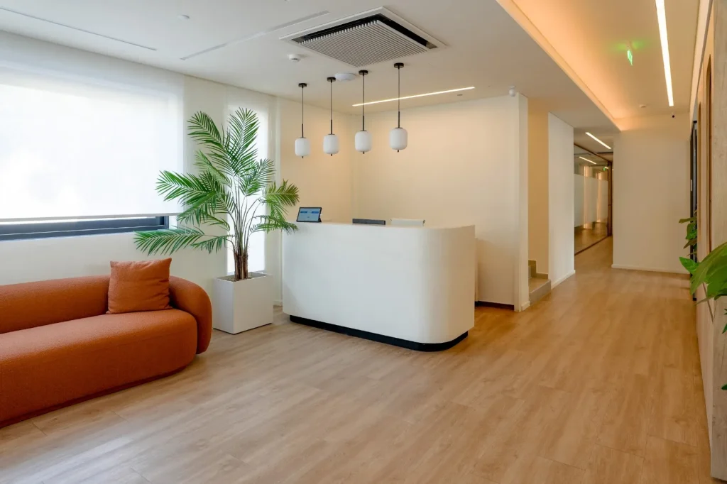 Reception desk and seating area at the Interelka offices in Koropi